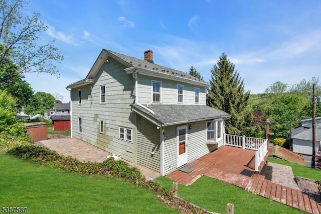 392 Pittstown Rd, Franklin Twp, NJ 08867 - rear view of property with a deck, a patio, a yard, and a chimney