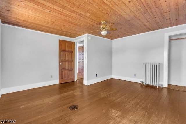 392 Pittstown Rd, Franklin Twp, NJ 08867 - empty room featuring radiator heating unit, wooden ceiling, crown molding, wood finished floors, and baseboards