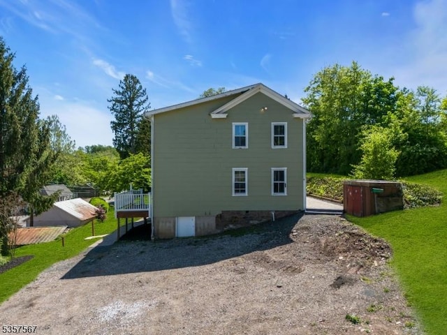 392 Pittstown Rd, Franklin Twp, NJ 08867 - view of home's exterior with a deck, a yard, and crawl space