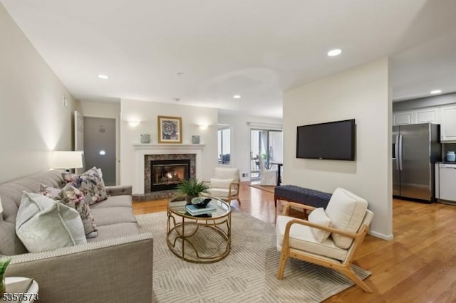 9 Larkin Unit 9, West Orange Twp, NJ 07052 - living room featuring light wood finished floors, recessed lighting, and a high end fireplace
