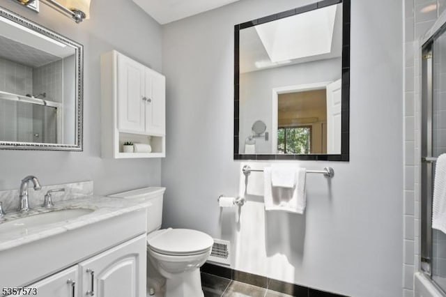9 Larkin Unit 9, West Orange Twp, NJ 07052 - bathroom featuring vanity, toilet, and tile patterned floors