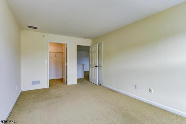 16 Swing Bridge Ln, South Bound Brook Boro, NJ 08880 - unfurnished bedroom with light carpet, a spacious closet, and a closet