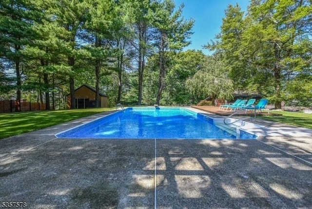 203 Stanhope Rd, Sparta Twp, NJ 07871 - swimming pool featuring view of wooded area and a patio area