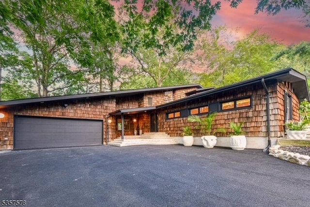 203 Stanhope Rd, Sparta Twp, NJ 07871 - view of front of property featuring a garage and asphalt driveway
