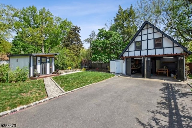garage with driveway