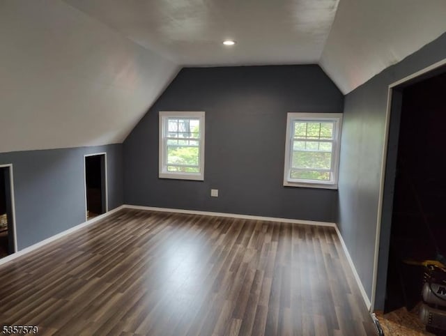 127 Severin Ct, Cranford Twp, NJ 07016 - additional living space with wood finished floors, vaulted ceiling, healthy amount of natural light, and baseboards