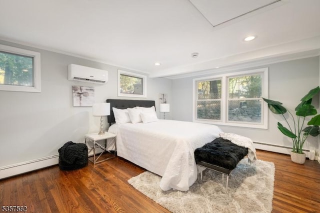 bedroom with a wall mounted AC, baseboard heating, recessed lighting, multiple windows, and dark wood finished floors