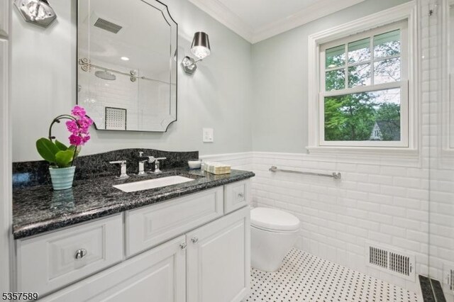 25 Woodcliff Dr, Madison Boro, NJ 07940 - full bathroom featuring tile walls, wainscoting, vanity, a tile shower, and crown molding