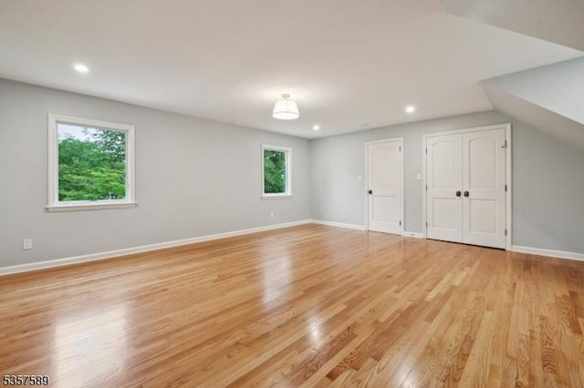 25 Woodcliff Dr, Madison Boro, NJ 07940 - unfurnished bedroom featuring light wood-style floors, recessed lighting, and multiple closets