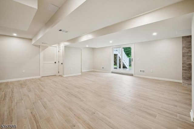 25 Woodcliff Dr, Madison Boro, NJ 07940 - below grade area with light wood-style flooring and recessed lighting
