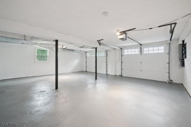 25 Woodcliff Dr, Madison Boro, NJ 07940 - garage featuring a garage door opener