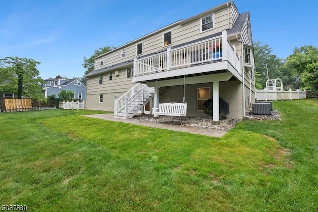 25 Woodcliff Dr, Madison Boro, NJ 07940 - back of house with stairway and a deck