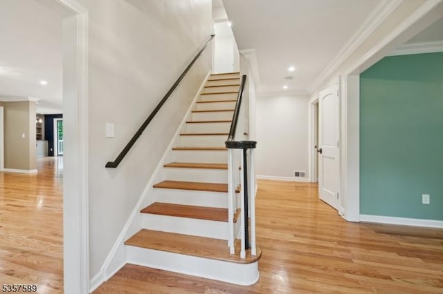 25 Woodcliff Dr, Madison Boro, NJ 07940 - stairway featuring crown molding, wood finished floors, and recessed lighting