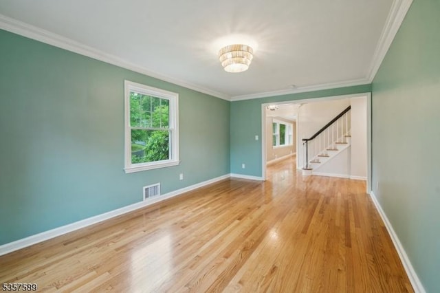 25 Woodcliff Dr, Madison Boro, NJ 07940 - unfurnished room with stairs, ornamental molding, wood finished floors, and a chandelier