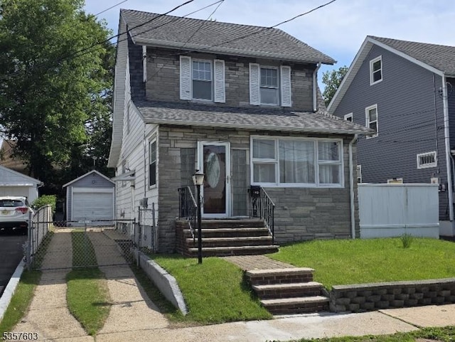 280 Fitzpatrick St, Hillside Twp, NJ 07205 - view of front of home with stone siding, a detached garage, entry steps, a shingled roof, and an outdoor structure