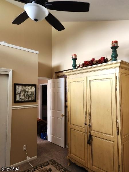 115 Seminole Rd Unit 115, Andover Twp, NJ 07848 - bedroom featuring dark colored carpet and ceiling fan