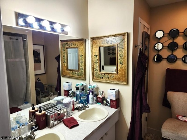 115 Seminole Rd Unit 115, Andover Twp, NJ 07848 - bathroom featuring double vanity and a shower with shower curtain