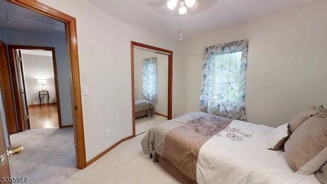 2764 Meister Ave, Union Twp, NJ 07083 - bedroom featuring a closet, light carpet, baseboards, and a ceiling fan
