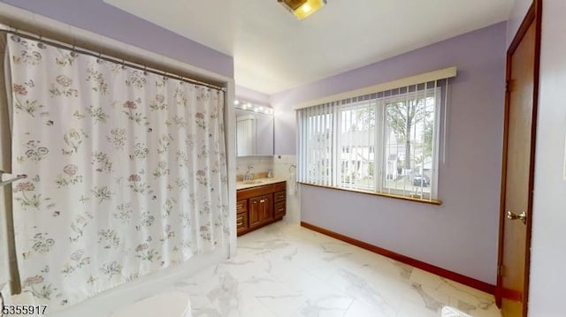 2764 Meister Ave, Union Twp, NJ 07083 - bathroom featuring baseboards, vanity, a shower with curtain, marble look tiles, and toilet