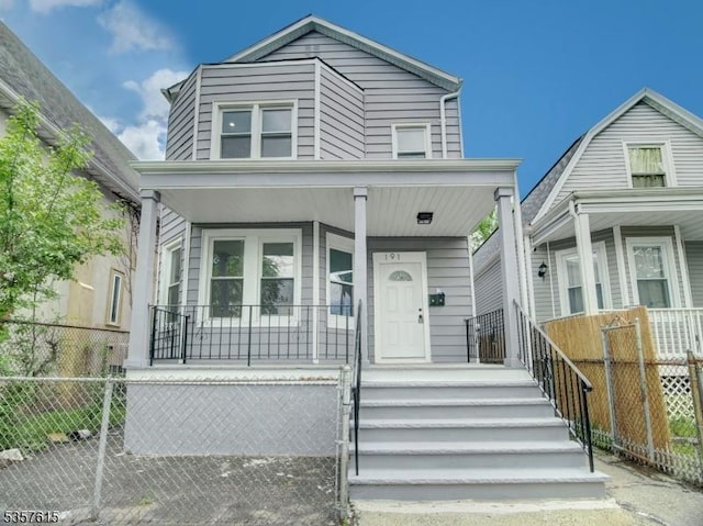 191 Matthew St, City Of Orange Twp, NJ 07050 - view of front facade with covered porch and fence