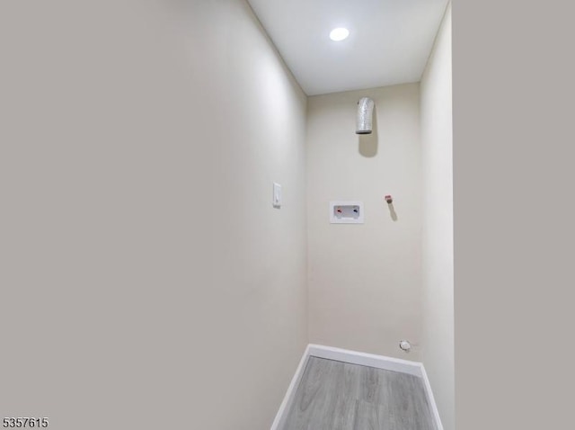 191 Matthew St, City Of Orange Twp, NJ 07050 - laundry area featuring hookup for a washing machine, baseboards, and wood finished floors