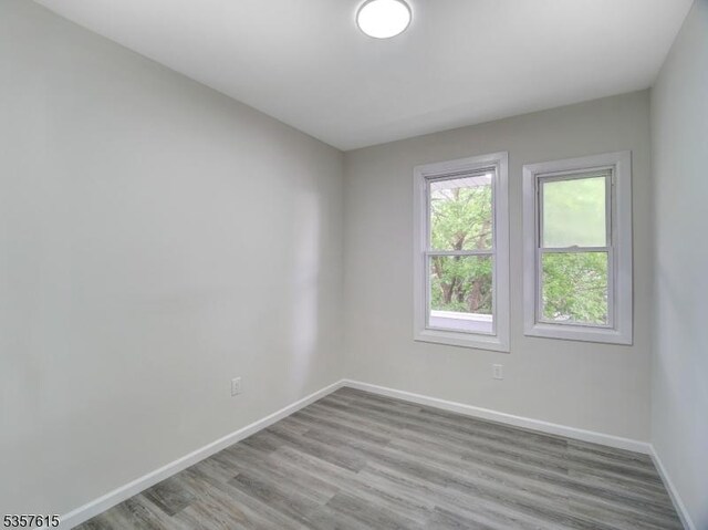 191 Matthew St, City Of Orange Twp, NJ 07050 - unfurnished room featuring baseboards and wood finished floors