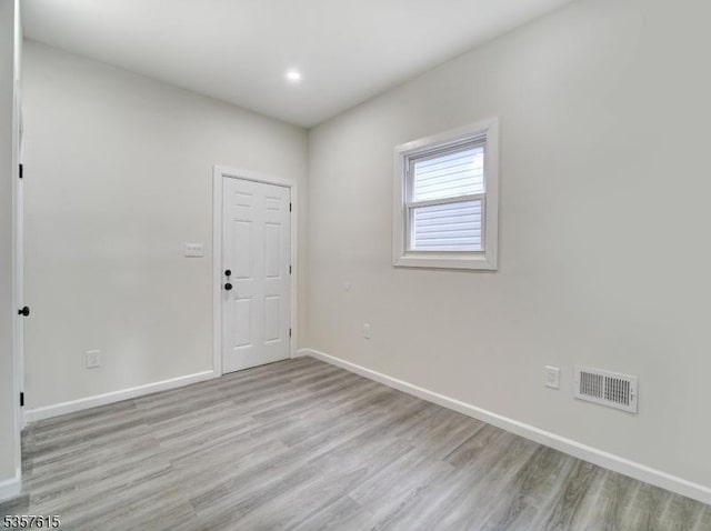 191 Matthew St, City Of Orange Twp, NJ 07050 - unfurnished room with light wood-type flooring, baseboards, and recessed lighting
