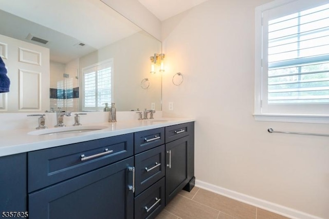 10 Cooper Ln, Long Hill Twp, NJ 07946 - full bathroom featuring double vanity, tiled shower, tile patterned floors, and baseboards