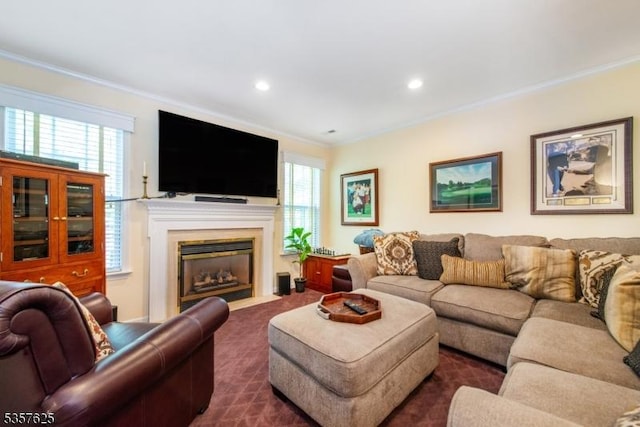 10 Cooper Ln, Long Hill Twp, NJ 07946 - living area featuring ornamental molding, a fireplace with flush hearth, dark colored carpet, and recessed lighting
