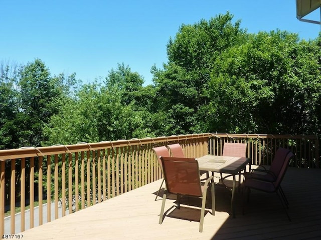deck with outdoor dining space