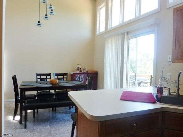 dining room with a high ceiling