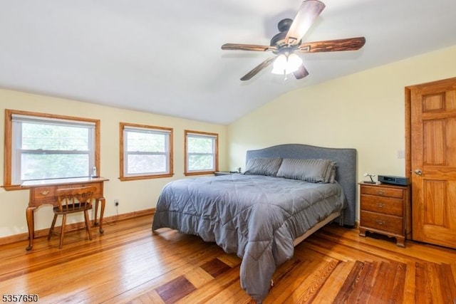 100 W Hanover Ave, Morris Twp, NJ 07950 - bedroom with multiple windows, vaulted ceiling, ceiling fan, and light wood finished floors
