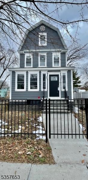261 Hickory St, City Of Orange Twp, NJ 07050 - colonial inspired home with a fenced front yard