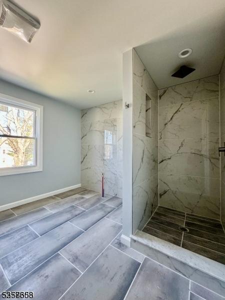 261 Hickory St, City Of Orange Twp, NJ 07050 - full bathroom featuring a marble finish shower and baseboards