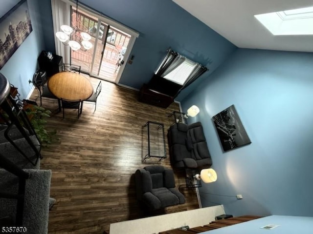 7 Deer Valley Ln Unit 6, Vernon Twp, NJ 07462 - living room with a skylight, wood finished floors, and vaulted ceiling