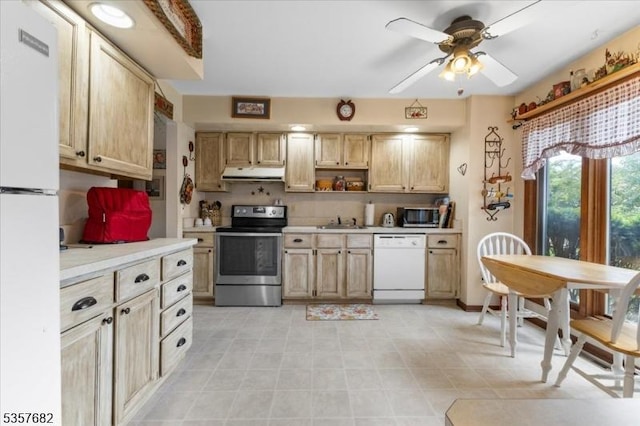 287 Cheyenne Rd, Andover Twp, NJ 07848 - kitchen featuring appliances with stainless steel finishes, under cabinet range hood, a sink, light countertops, and a ceiling fan