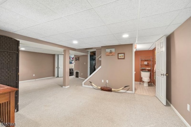 finished below grade area featuring carpet flooring, baseboards, and recessed lighting