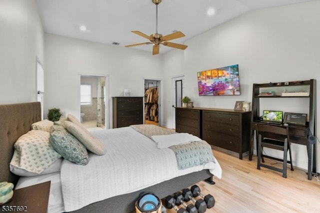 77 E Main St, Mendham Boro, NJ 07945 - bedroom with wood finished floors, a spacious closet, ensuite bath, lofted ceiling, and a closet