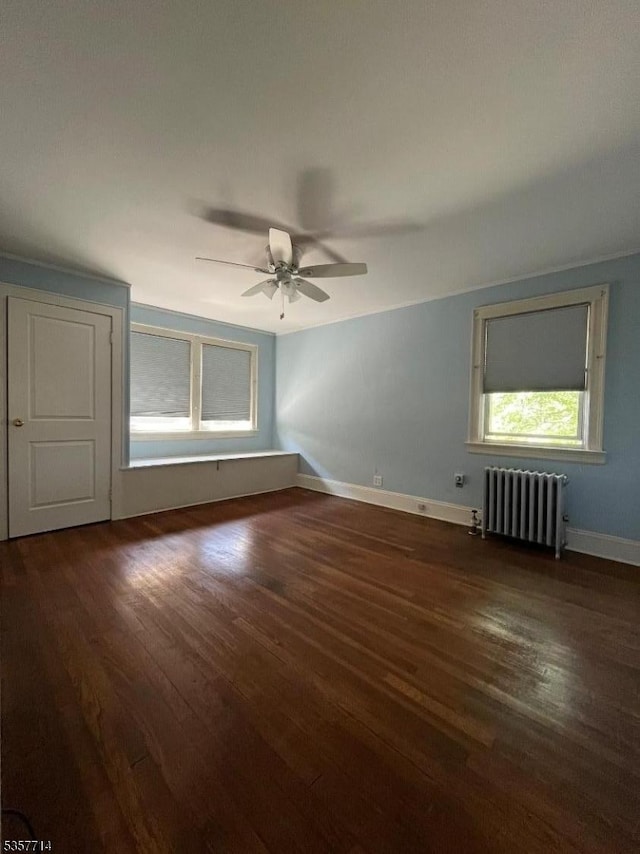 201 W Passaic Ave, Bloomfield Twp, NJ 07003 - empty room featuring radiator heating unit, a ceiling fan, wood finished floors, and baseboards