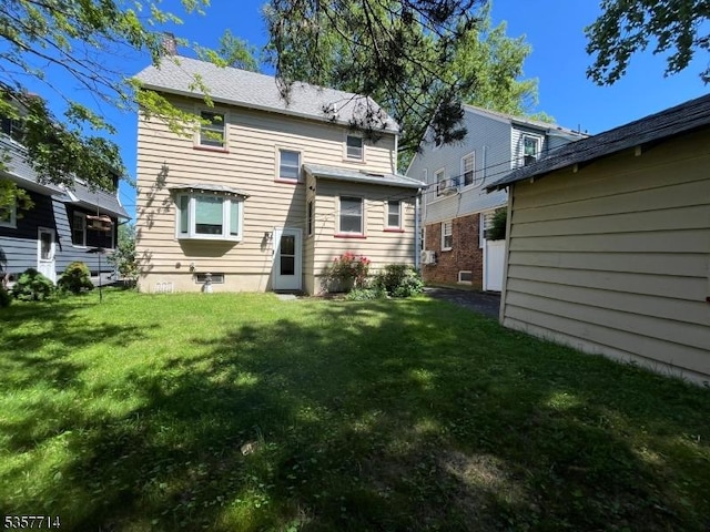 201 W Passaic Ave, Bloomfield Twp, NJ 07003 - back of house with a yard and a chimney