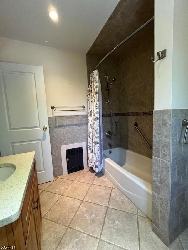 201 W Passaic Ave, Bloomfield Twp, NJ 07003 - bathroom with shower / bath combo with shower curtain, vanity, tile patterned floors, tile walls, and wainscoting