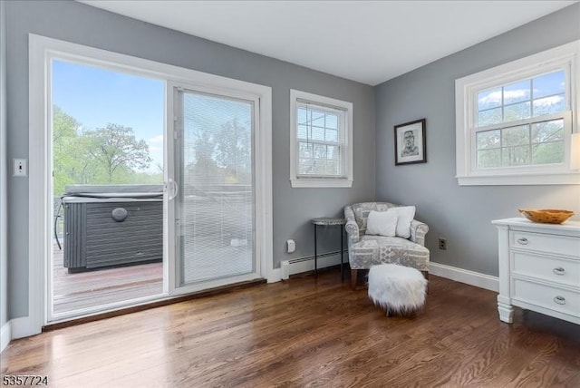 1011 Stillwater Rd, Stillwater Twp, NJ 07860 - sitting room featuring a baseboard heating unit, dark wood-style flooring, and baseboards