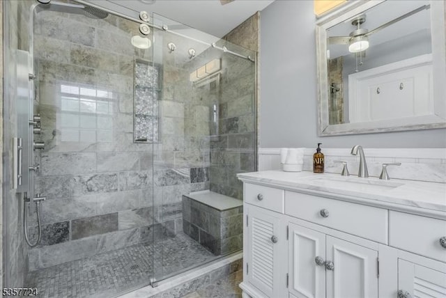 1011 Stillwater Rd, Stillwater Twp, NJ 07860 - bathroom featuring a shower stall, vanity, and wainscoting