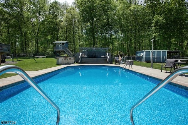 1011 Stillwater Rd, Stillwater Twp, NJ 07860 - view of swimming pool featuring a wooden deck and stairway