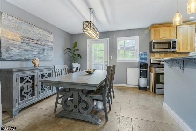 1011 Stillwater Rd, Stillwater Twp, NJ 07860 - dining space featuring stone tile flooring and baseboards
