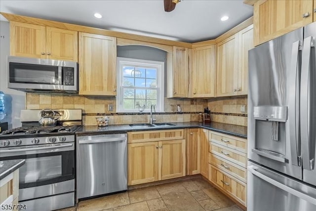 1011 Stillwater Rd, Stillwater Twp, NJ 07860 - kitchen featuring stainless steel appliances, a sink, dark countertops, light brown cabinetry, and recessed lighting