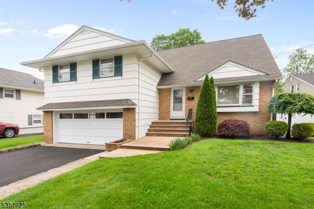 3 Red Maple Ln, Kenilworth Boro, NJ 07033 - split level home with brick siding, driveway, a garage, and a front lawn