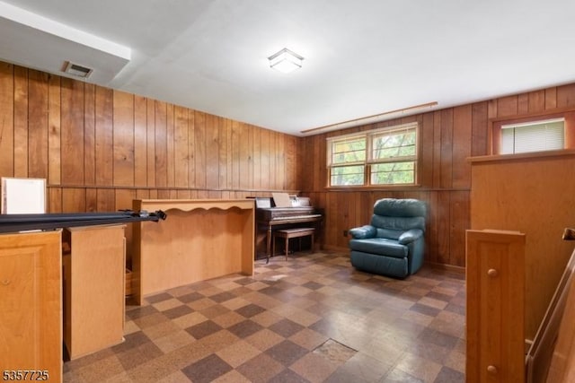 3 Red Maple Ln, Kenilworth Boro, NJ 07033 - living area featuring tile patterned floors and wood walls