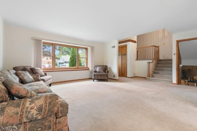 3 Red Maple Ln, Kenilworth Boro, NJ 07033 - living room featuring stairs, carpet flooring, and baseboards