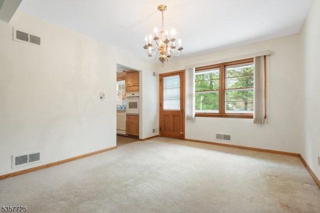 3 Red Maple Ln, Kenilworth Boro, NJ 07033 - empty room with a chandelier, light carpet, and baseboards